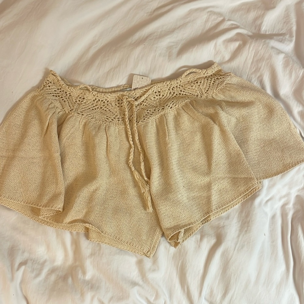 Khaki Free People beach shorts, size L, loose fit